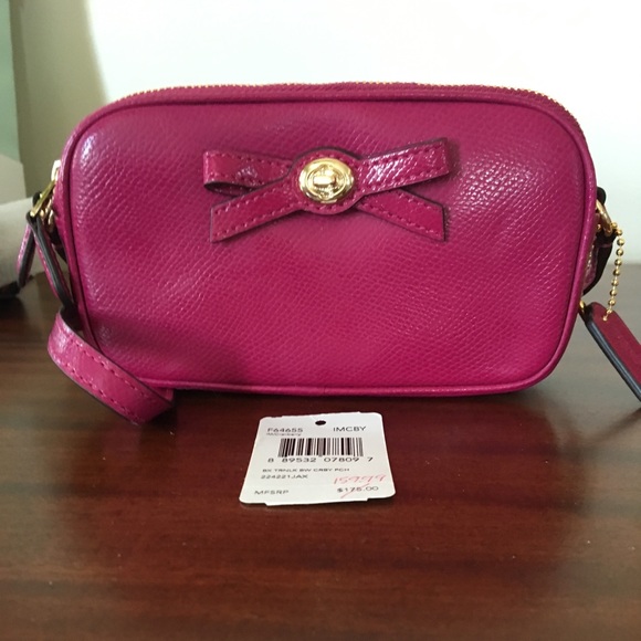 Coach Handbags - COACH Turnlock Bow Crossbody Pouch in Cranberry
